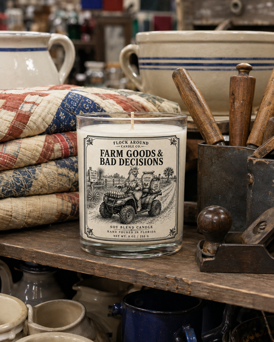 Not My First Rodeo Candle 9 oz on a farm table with antique quilts and crocks
