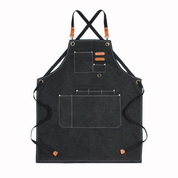 Black chore apron pocket and hardware detail
