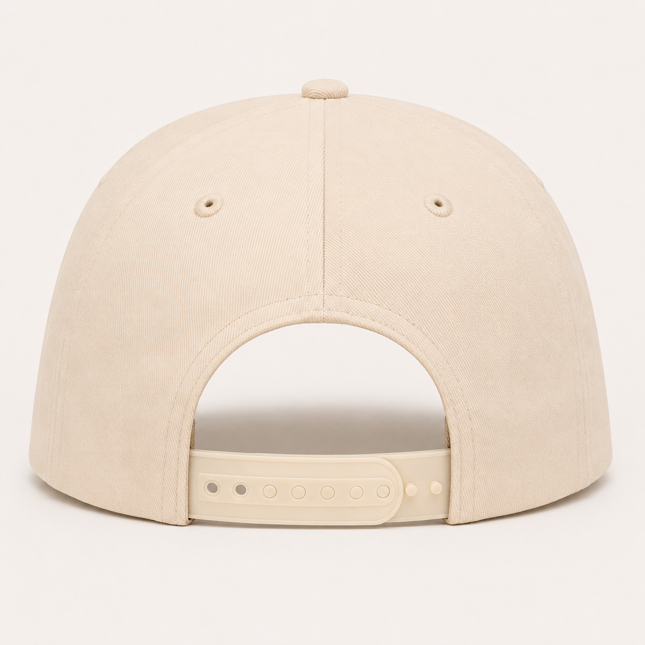 Cream baseball cap back view with adjustable snapback closure