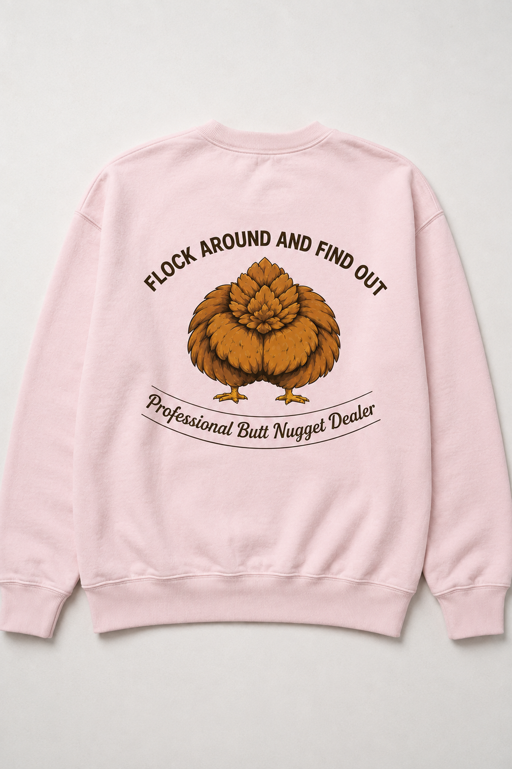 Light pink sweatshirt flat lay back view with the Professional Butt Nugget Dealer emblem